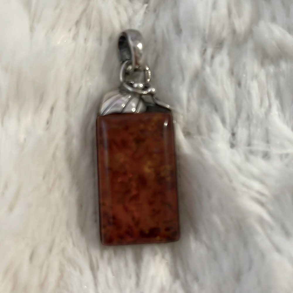 AMBER PENDANT WITH INCLUSIONS BIGGER THAN A QUARTER VINTAGE STERLING SILVER PEND